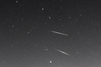 image of two Geminid meteors